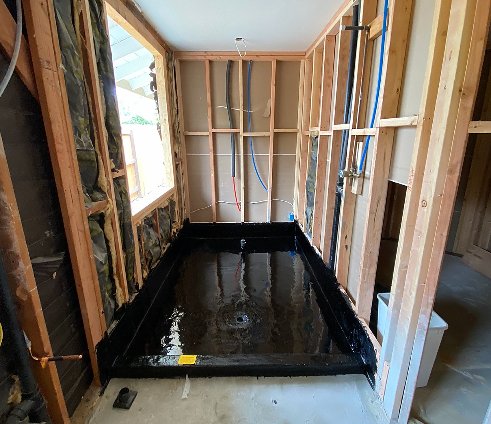 Master bath shower pan waterproofing during construction