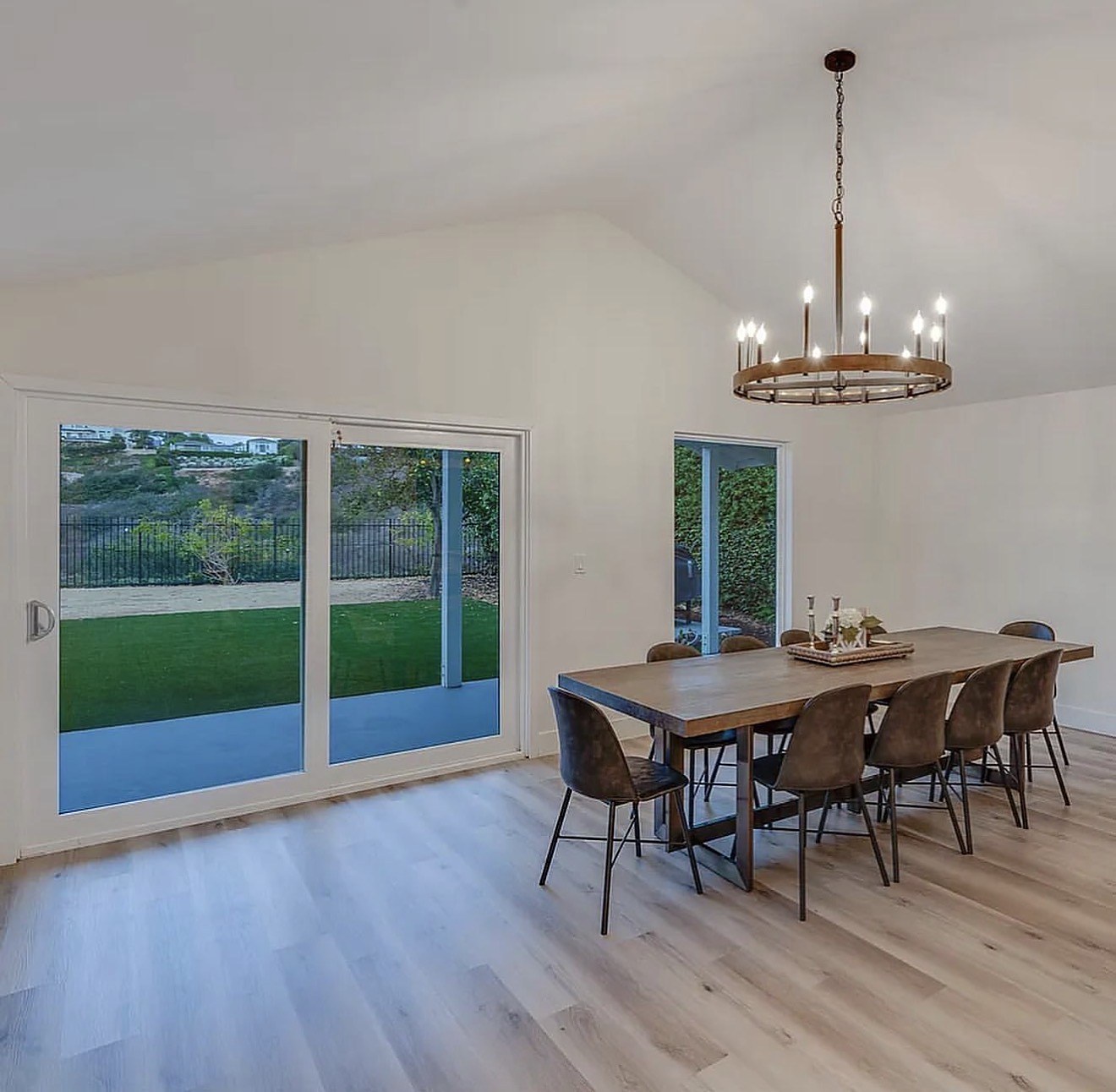 Dining addition completed with chandelier and patio access