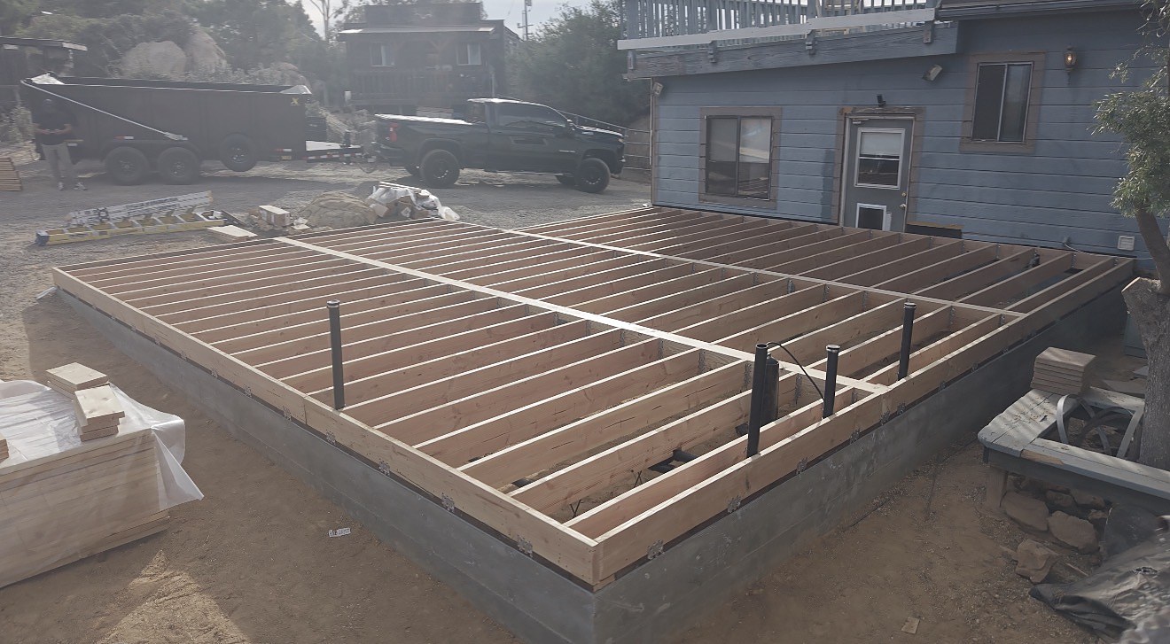 Floor joists installed on the concrete foundation